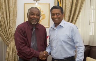 President receives longest serving public servant Justice Bernadin Renaud