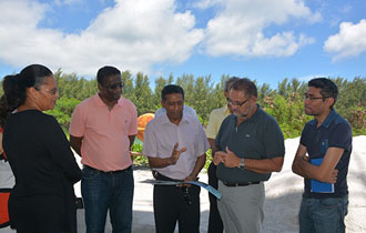 President Faure reviews progress of Graduate Condominium Project